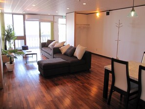 Deluxe Room, 2 Bedrooms, Non Smoking, Partial Ocean View (202) | Living area - Hibisu yabu (Nago)