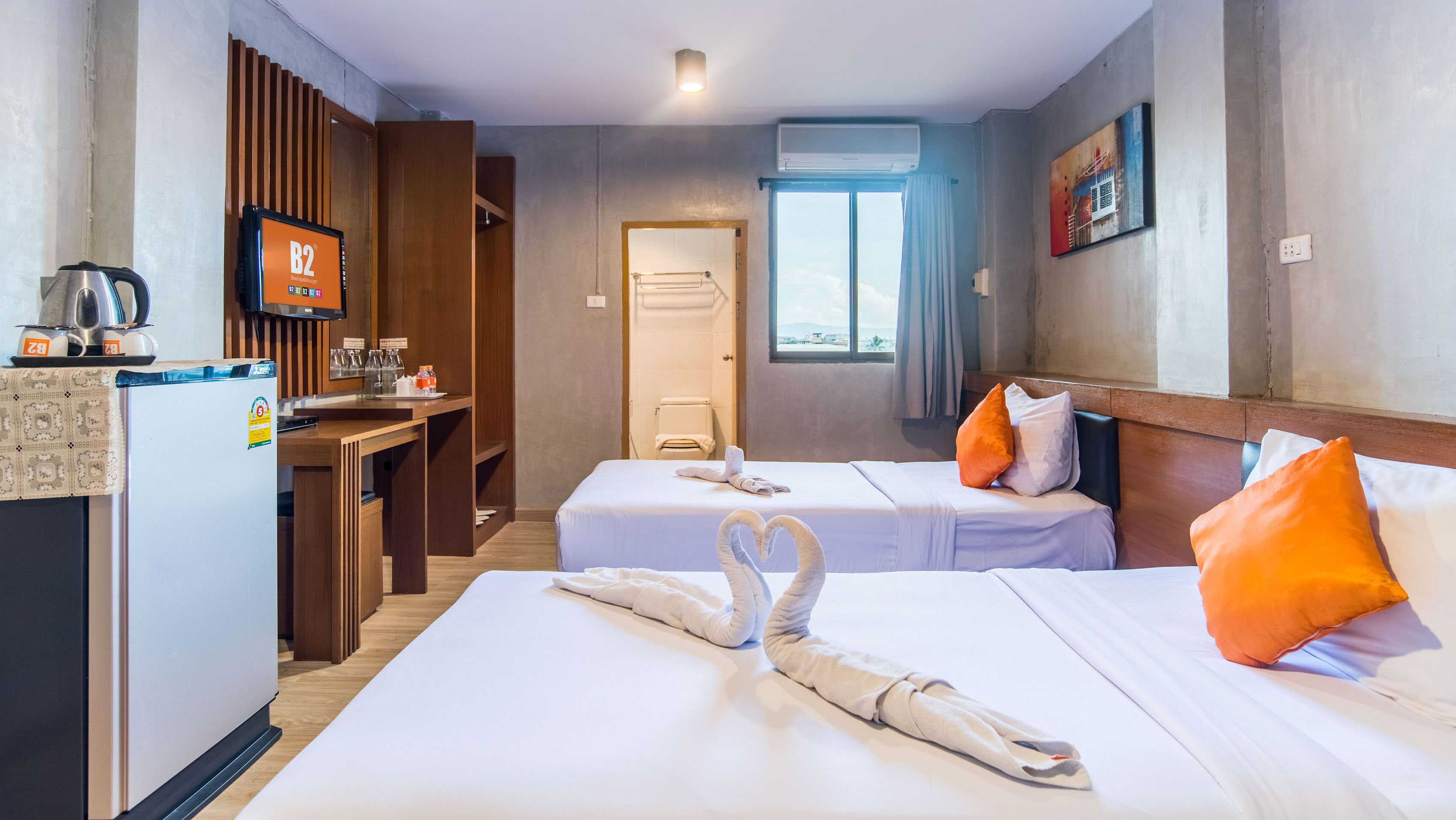 Deluxe kamer | Een bureau, gratis wifi, beddengoed