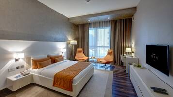 Deluxe Double Room | Minibar, in-room safe, iron/ironing board, free WiFi