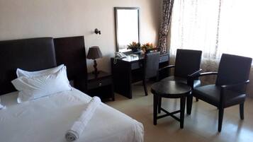 Executive Room (Superior) | Premium bedding, desk, laptop workspace, iron/ironing board
