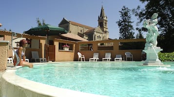 Seasonal outdoor pool, pool loungers