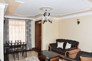 Standard Apartment, 1 Bedroom | Living room - Acacia Luxurious Apartments (Nairobi)
