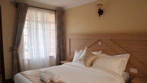 Standard Apartment, 1 Bedroom | Desk, laptop workspace, WiFi (free), individually furnished - Acacia Luxurious Apartments (Nairobi)