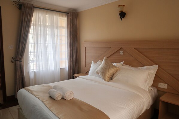 Apartamento standard, 1 quarto | Individualmente mobiliados, escrivaninha