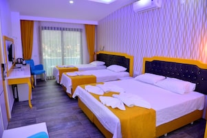 Family Room | Minibar, free WiFi, bed sheets