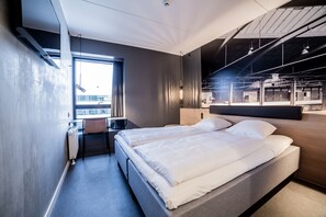 Hypoallergeen beddengoed, een bureau, geluiddichte muren, gratis wifi