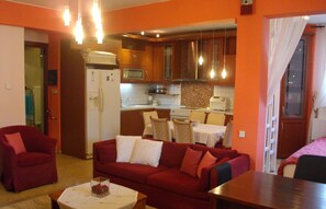 Flat-screen TV, fireplace, DVD player, stereo