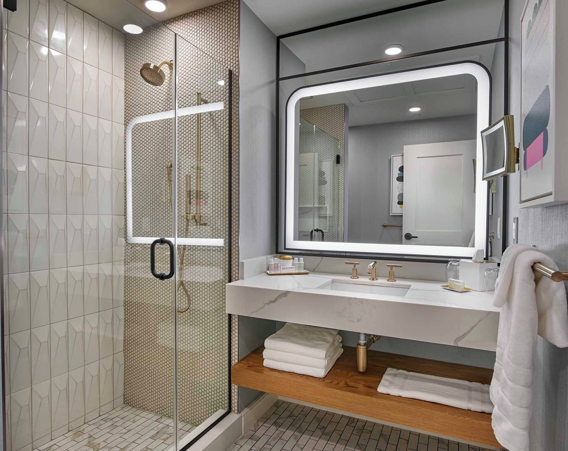 standard single room | bathroom | rainfall showerhead, free toiletries, hair dryer, bathrobes