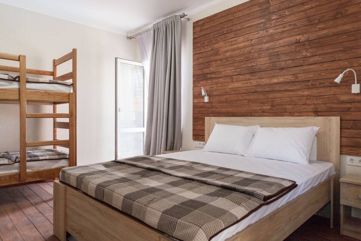 Basic Quadruple Room | In-room safe, desk, blackout curtains, iron/ironing board (on request)