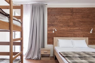 Basic Quadruple Room | In-room safe, desk, blackout drapes, iron/ironing board