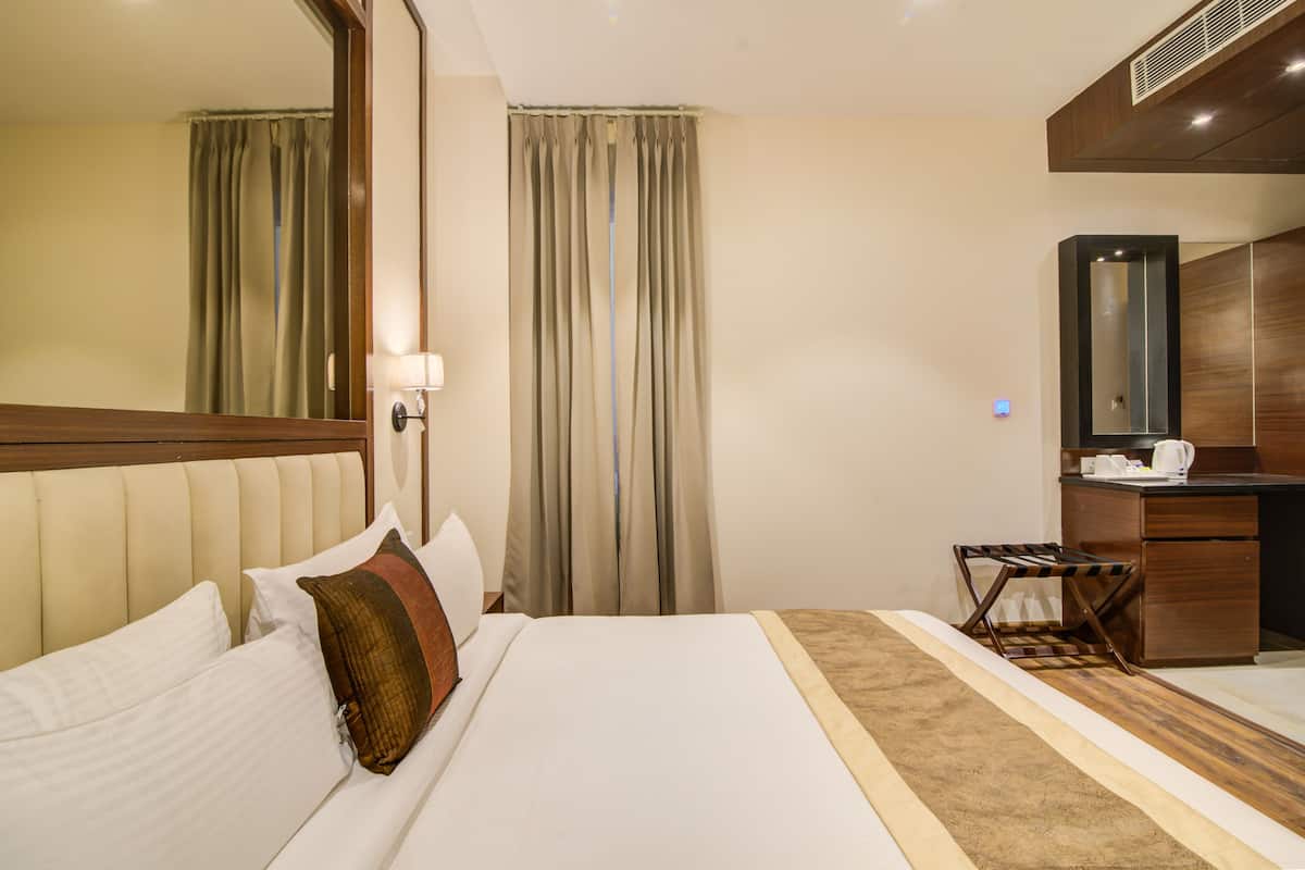 Habitación estándar | Ropa de cama de alta calidad y minibar