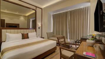 Executive Room | Premium bedding, minibar, in-room safe, individually furnished