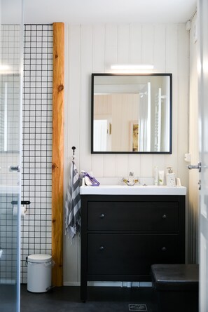 Apartment, 1 Bedroom (An Artistic Experience) | Bathroom | Shower, hair dryer, bathrobes, towels - House of the Snowbird (Reykjavik)