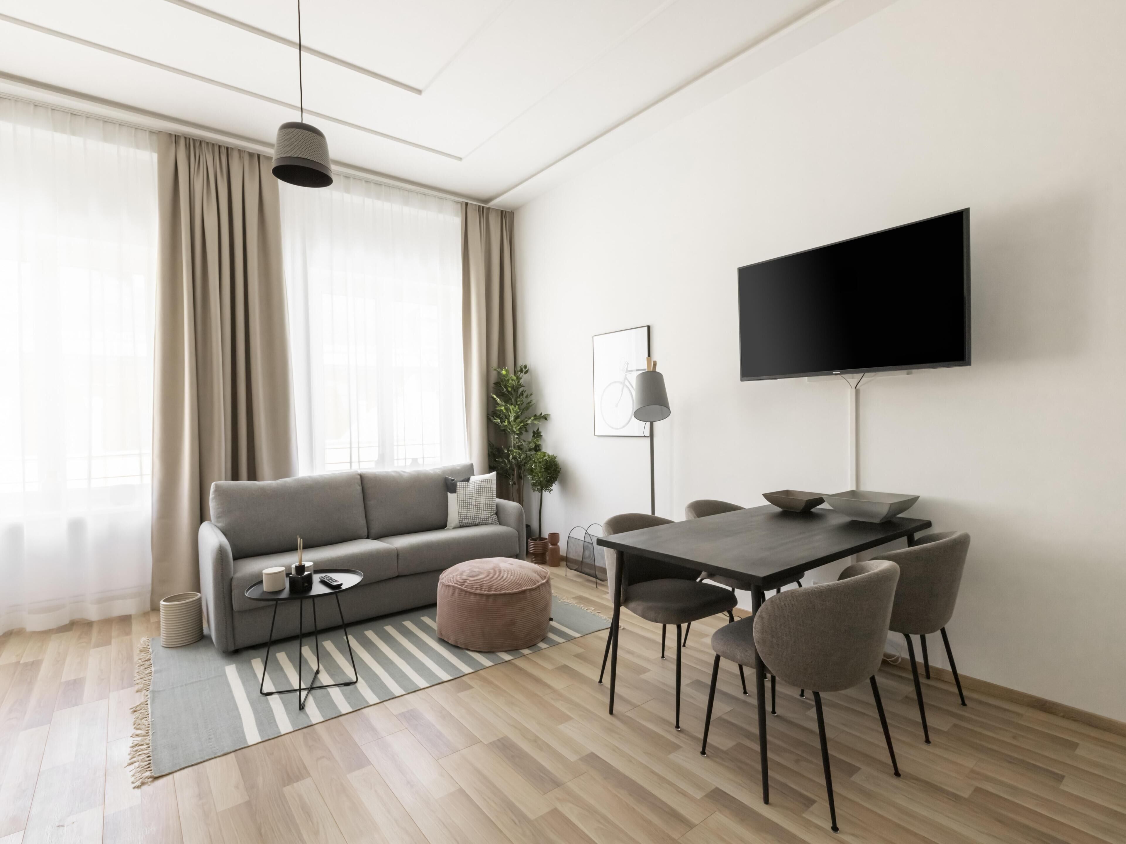 Suite XL with sofa bed | Wohnbereich | Fernseher