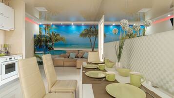 Apartment, 3 Bedrooms | Living room | Flat-screen TV