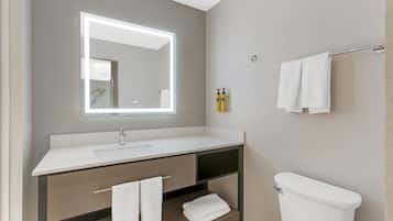 Suite, 1 King Bed, Non Smoking, Jetted Tub (with Sofabed) | Bathroom | Combined shower/tub, free toiletries, hair dryer, towels