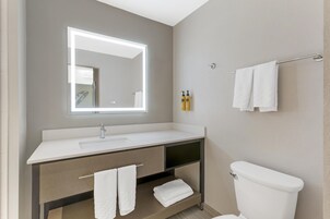 Suite, 1 King Bed, Non Smoking, Jetted Tub (with Sofabed) | Bathroom | Combined shower/tub, free toiletries, hair dryer, towels