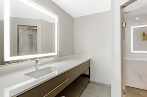 Suite, 1 King Bed, Non Smoking, Jetted Tub (with Sofabed) | Bathroom | Combined shower/tub, free toiletries, hair dryer, towels