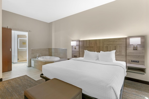 Suite, 1 King Bed, Non Smoking, Jetted Tub (with Sofabed) | Desk, laptop workspace, free cribs/infant beds, free WiFi