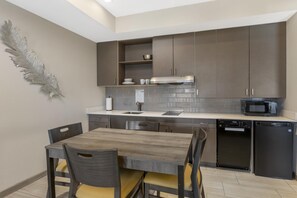 Standard Room, 2 Queen Beds, Non Smoking, Kitchenette | 1 bedroom, desk, laptop workspace, free cribs/infant beds