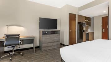 1 habitación, escritorio y espacio para trabajar con laptop