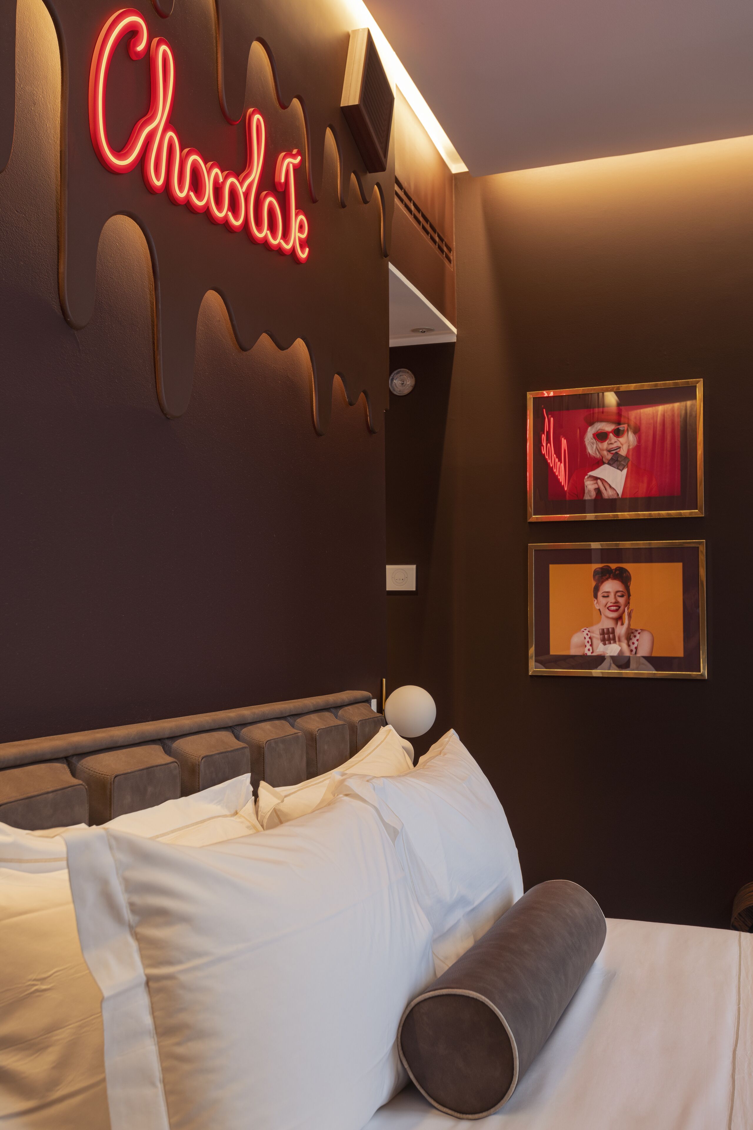 Premium bedding, down comforters, memory foam beds, minibar (free items)