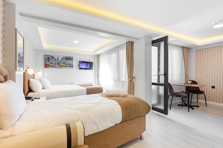 Ropa de cama de alta calidad y minibar