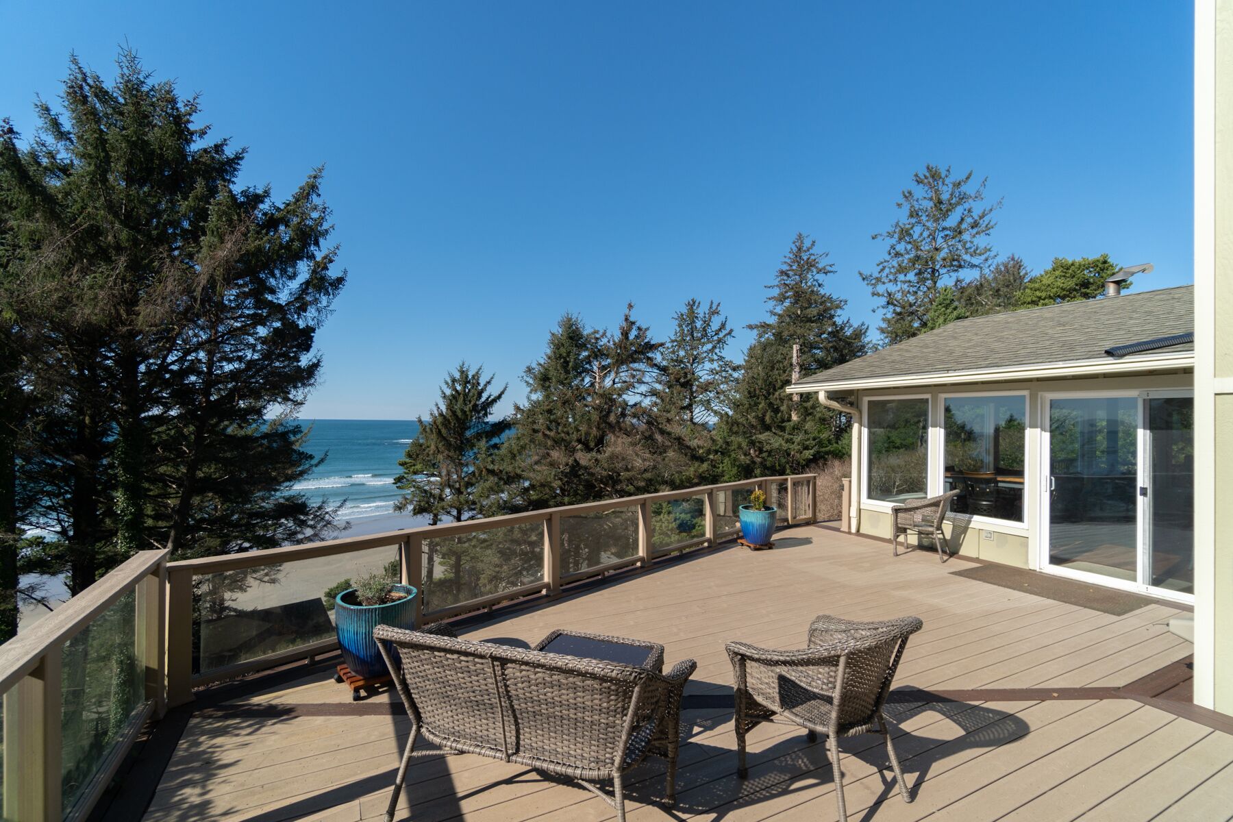 Breathtaking Views from the large deck or inside this beachfront home await you
