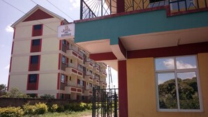 A multi-story building with a sign for a Jambo Beer House. - Hotel Daddy's (Thika)