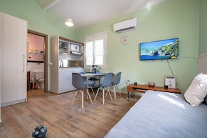 Family Bungalow, 1 Bedroom | Living area | 28-inch Smart TV with digital channels, TV
