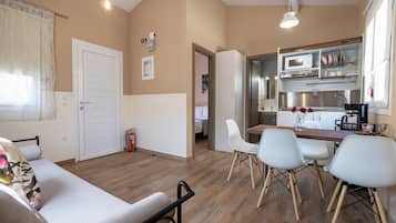Family Bungalow, 1 Bedroom | Living area | 28-inch Smart TV with digital channels, TV