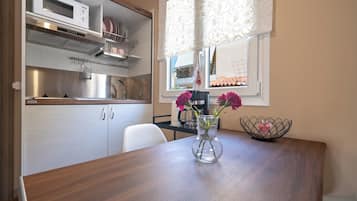 Family Bungalow, 1 Bedroom | Private kitchen | Fridge, microwave, oven, stovetop