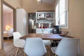 Family Bungalow, 1 Bedroom | Living area | 28-inch Smart TV with digital channels, TV - Olympia's Apartments (Spata-Artemida)