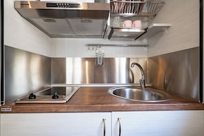 Family Bungalow, 1 Bedroom | Private kitchen | Fridge, microwave, oven, stovetop