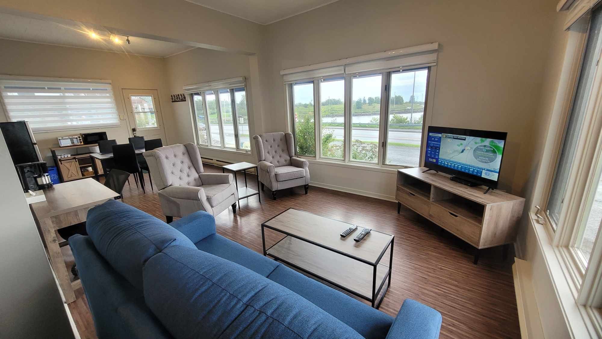 Panoramic Suite, 1 Bedroom, Sea View | Living area | 15-inch TV with digital channels