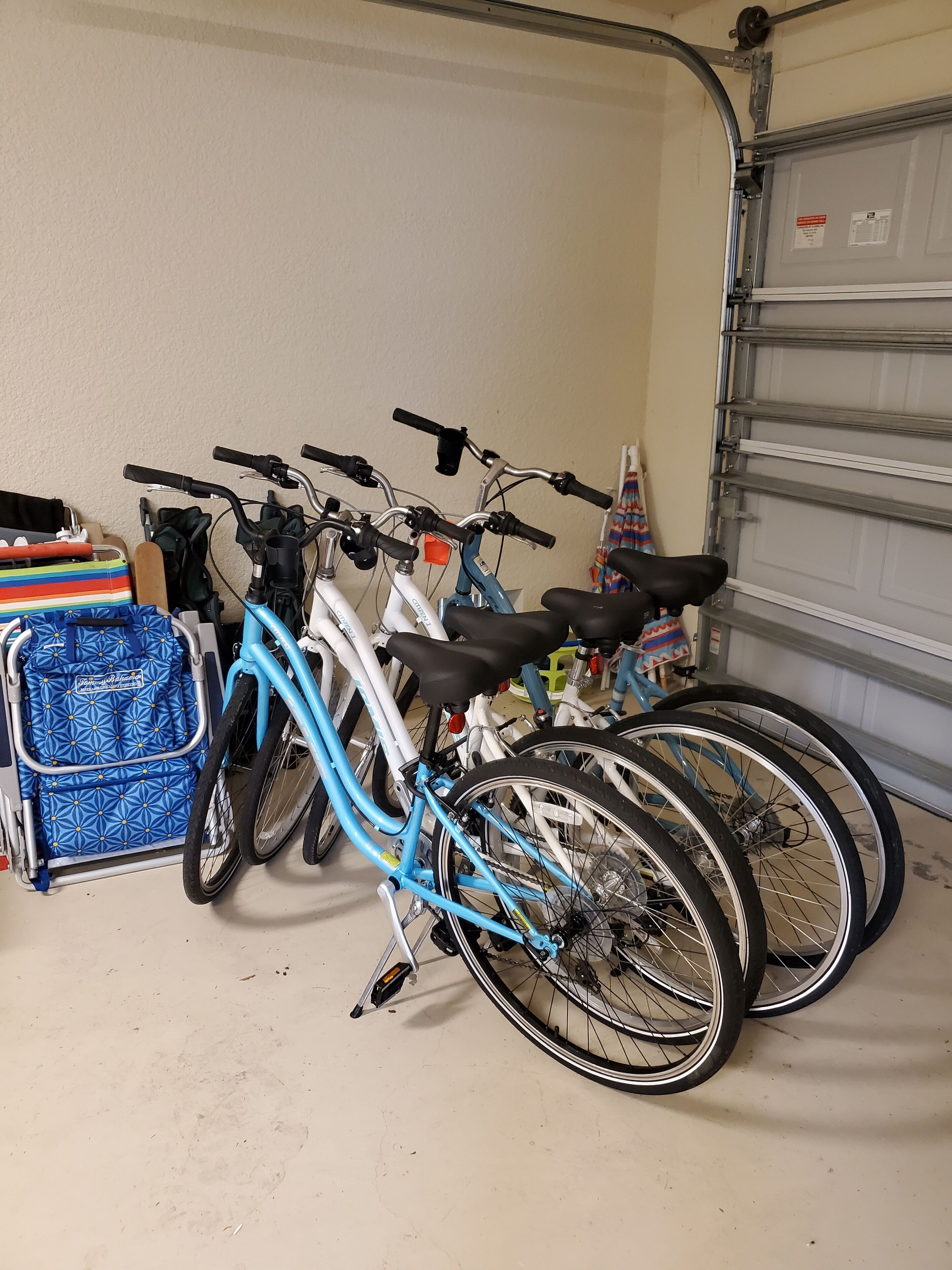 A garage with bicycles parked inside.