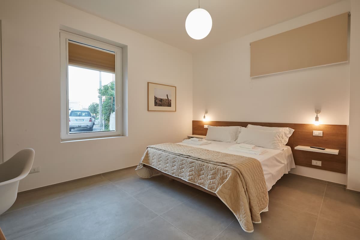 Classic Quadruple Room | Hypo-allergenic bedding available, down comforters, minibar, desk