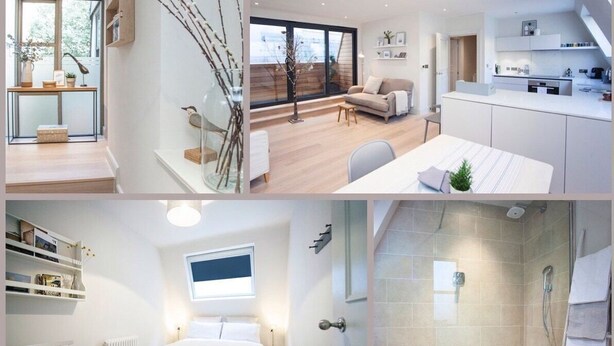 Un apartamento moderno con sala de estar, cocina, dormitorio y baño.