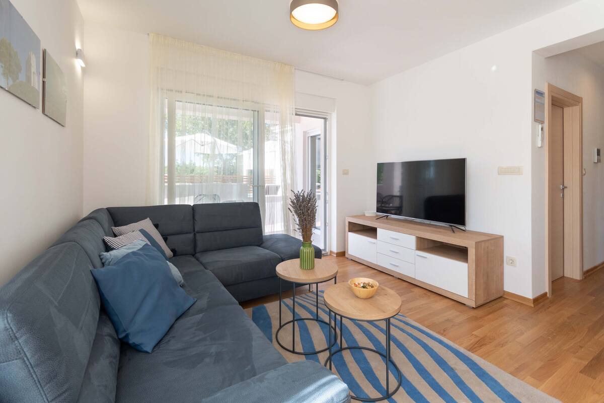 Apartment, 2 Bedrooms (More) | Living area | Flat-screen TV, fireplace