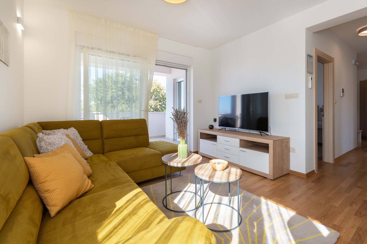 Apartment, 2 Bedrooms (Sunce) | Living area | Flat-screen TV, fireplace
