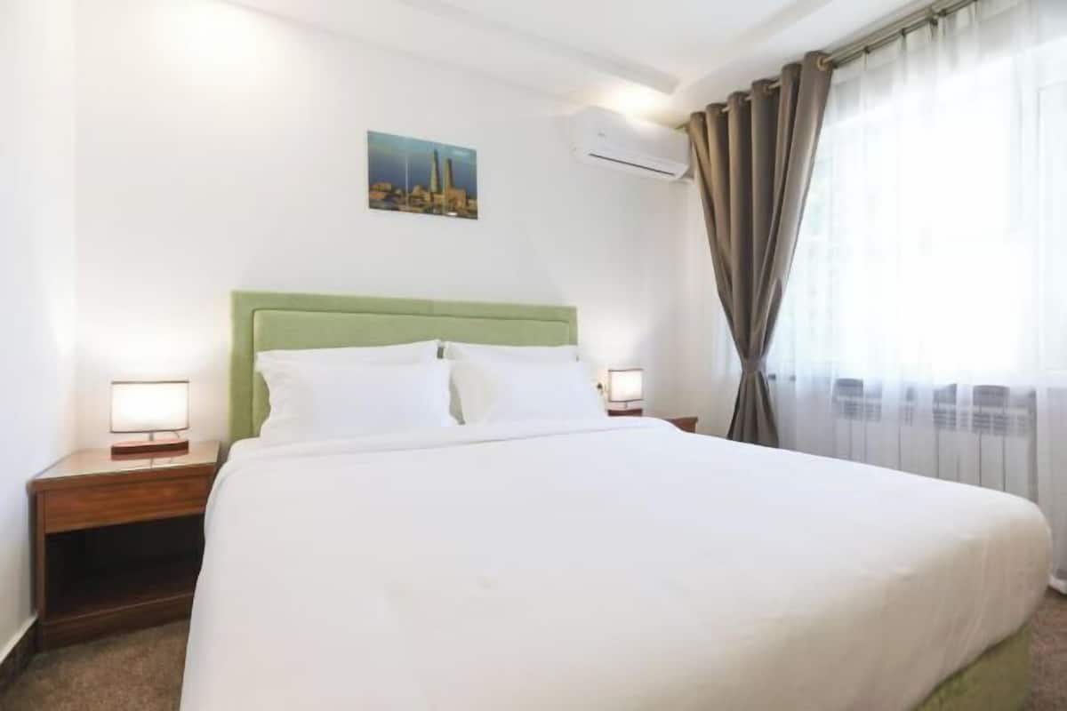 Premium bedding, desk, laptop workspace, WiFi (free)