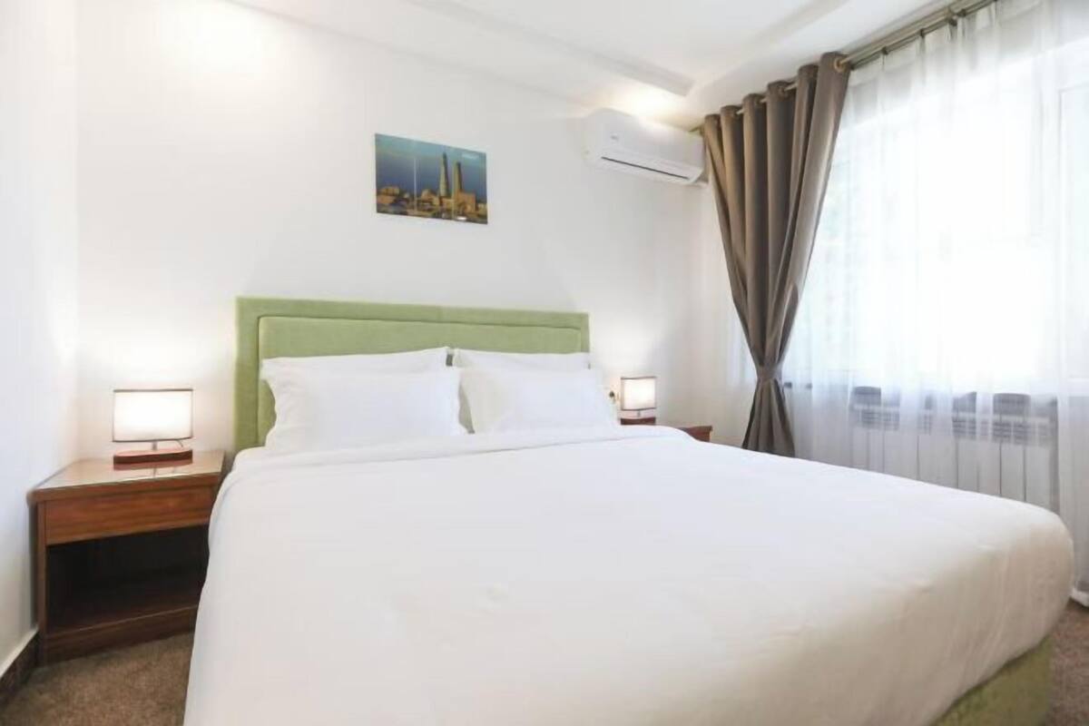 Premium bedding, desk, laptop workspace, free WiFi
