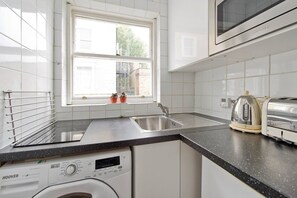 Oven, cookware/dishes/utensils