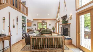 TV connectée, cheminée, jeux vidéo, lecteur de DVD