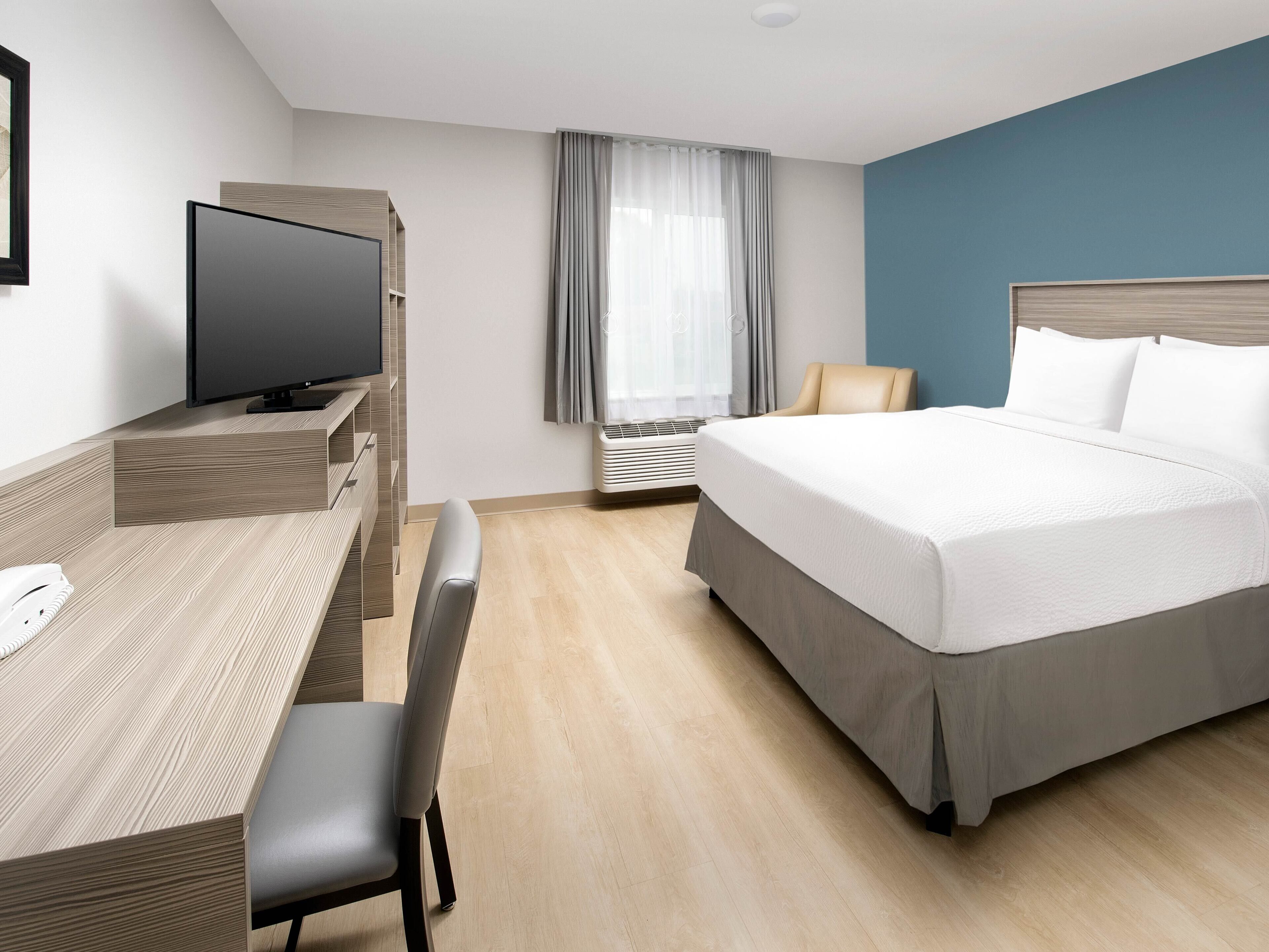 Desk, laptop workspace, free WiFi, bed sheets