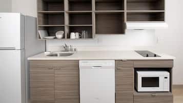 Full-sized fridge, microwave, stovetop