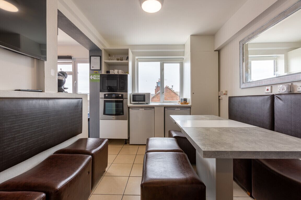 Microwave, dishwasher, coffee/tea maker, cookware/dishes/utensils