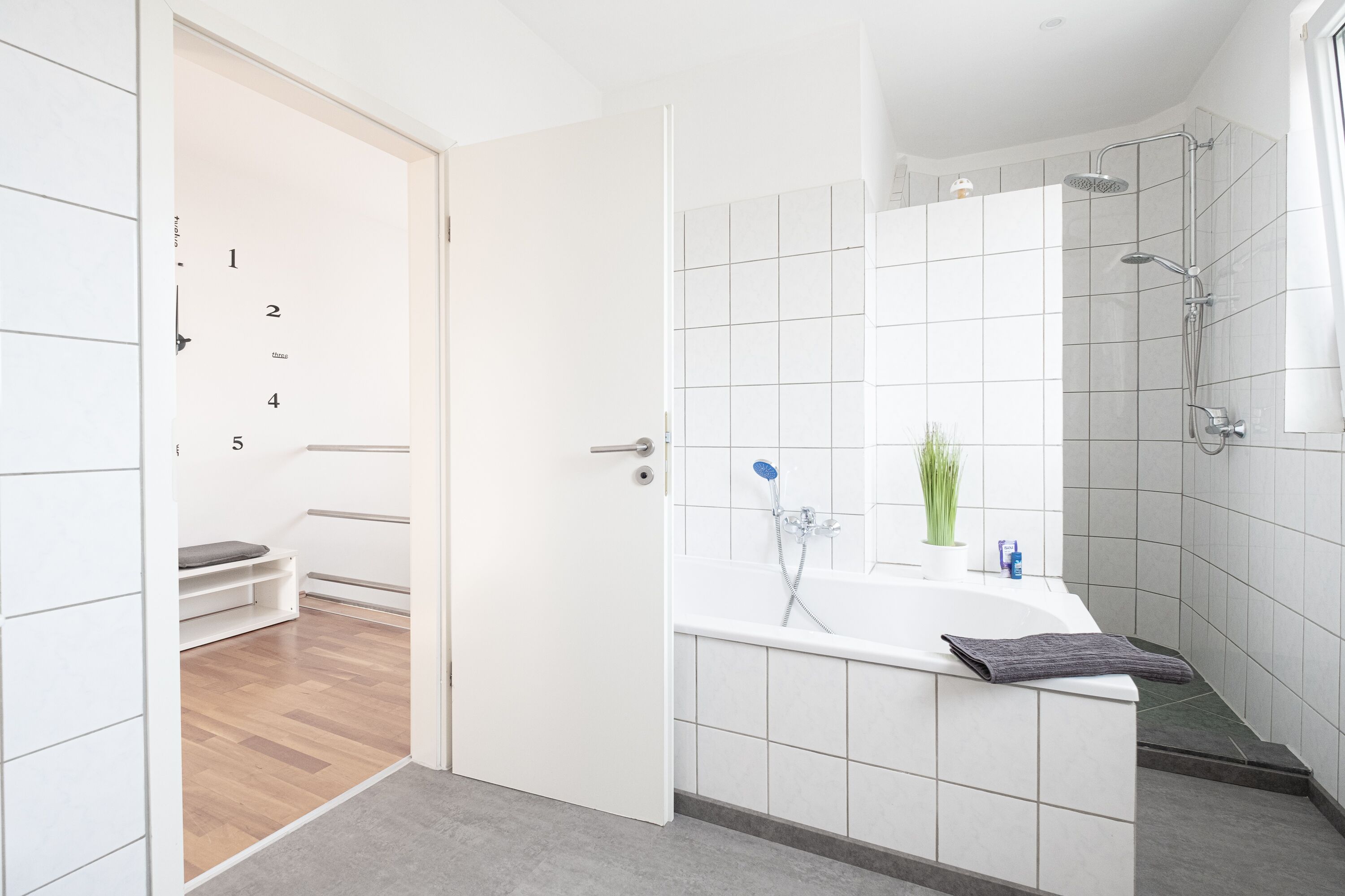 Bathtub, hair dryer, towels, soap
