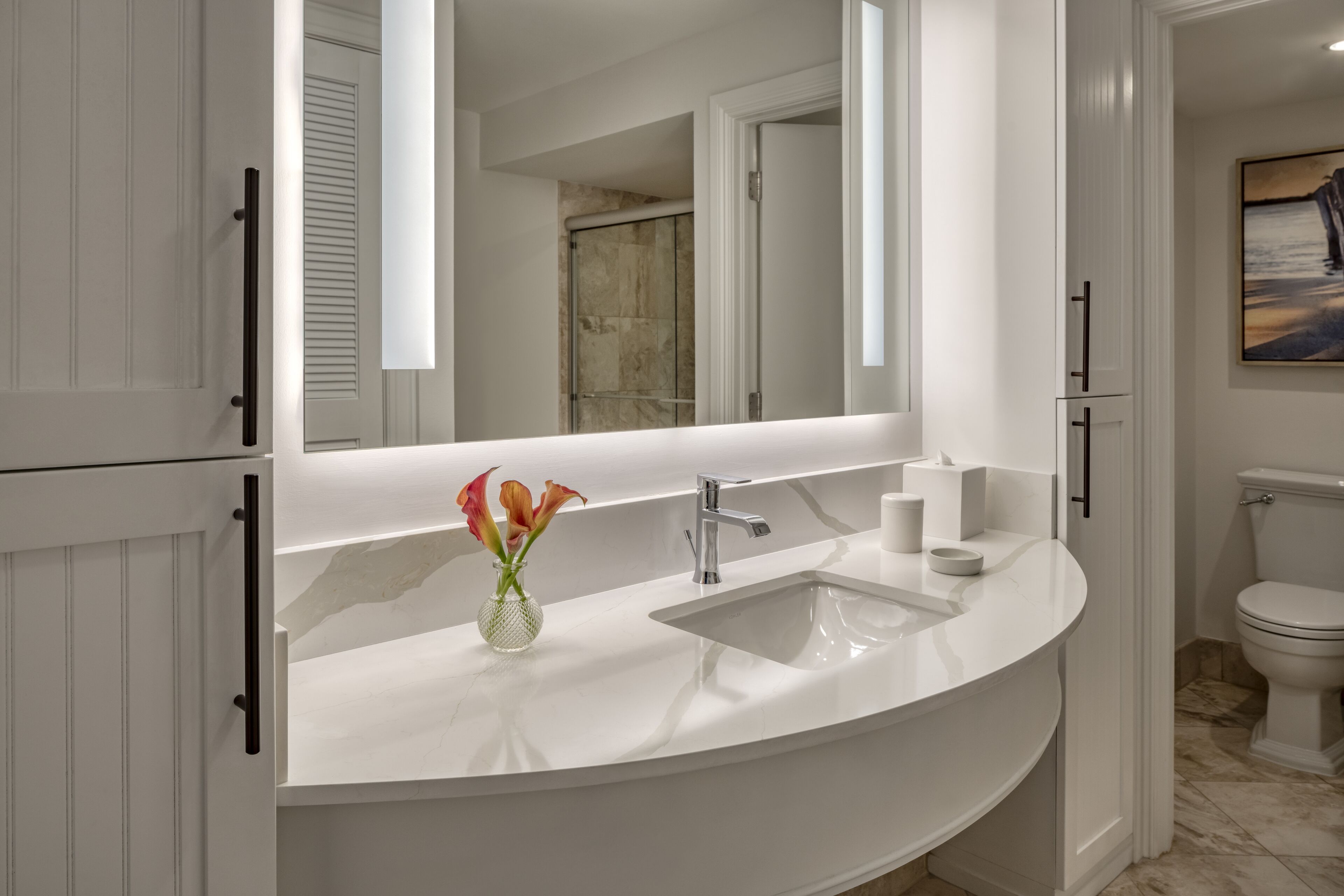 designer toiletries, hair dryer, towels, soap