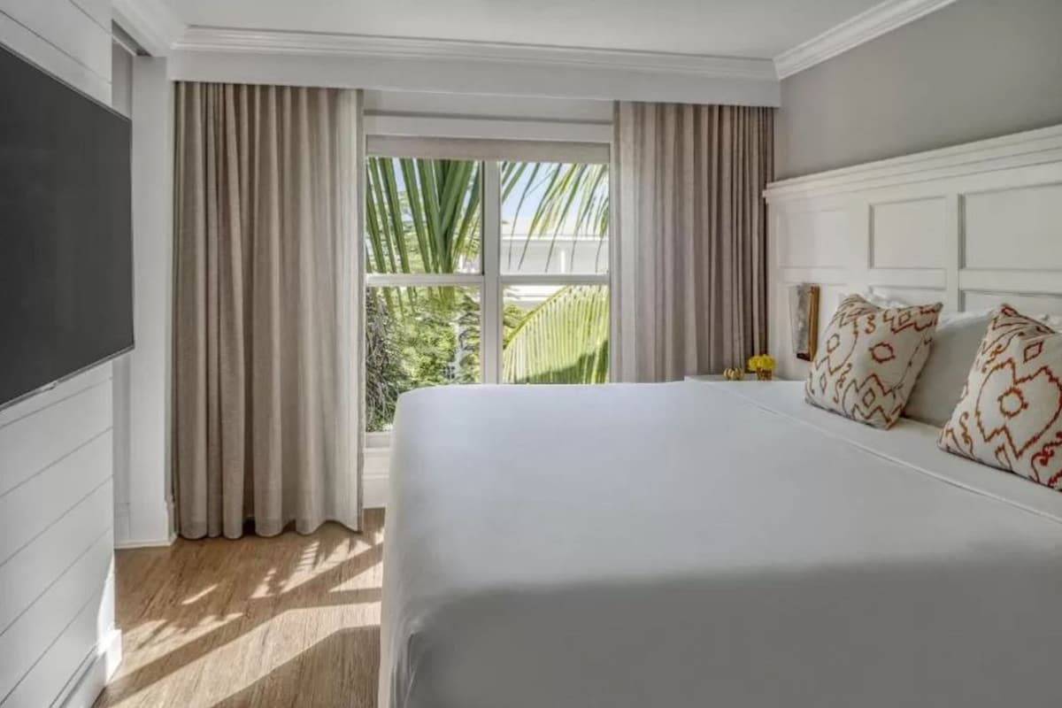 Hypo-allergenic bedding available, down comforters, in-room safe